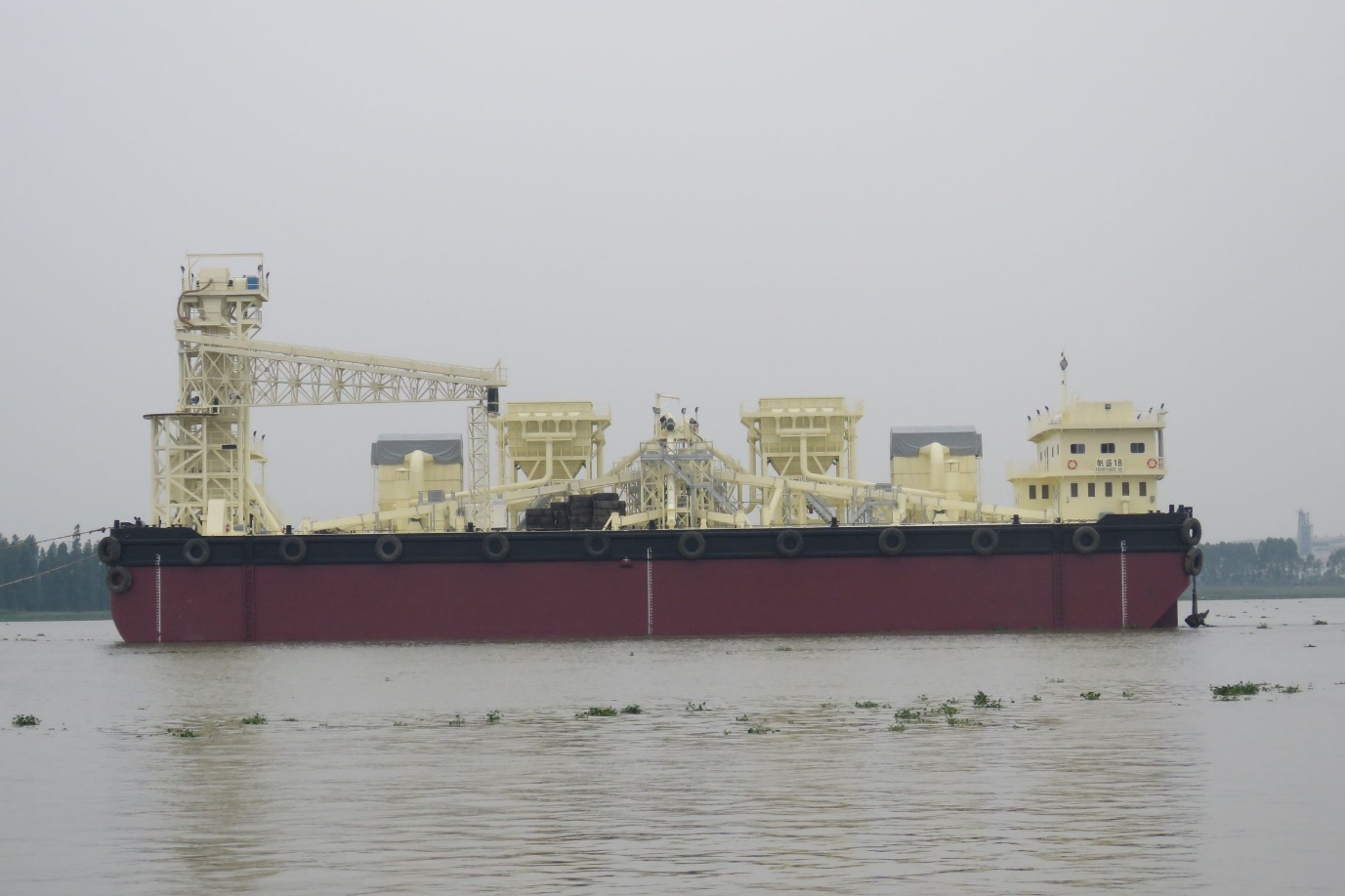 Cement handling plant installed on a large barge in Hong Kong