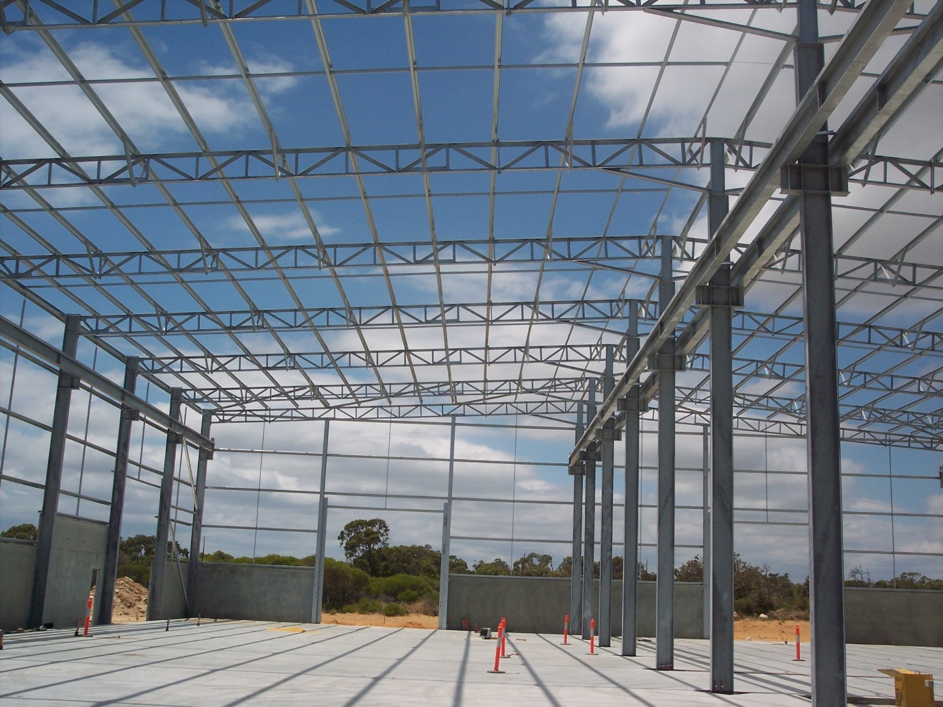 Large steel frame for an industrial dust cover during installation